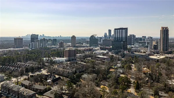 a view of a city with tall buildings