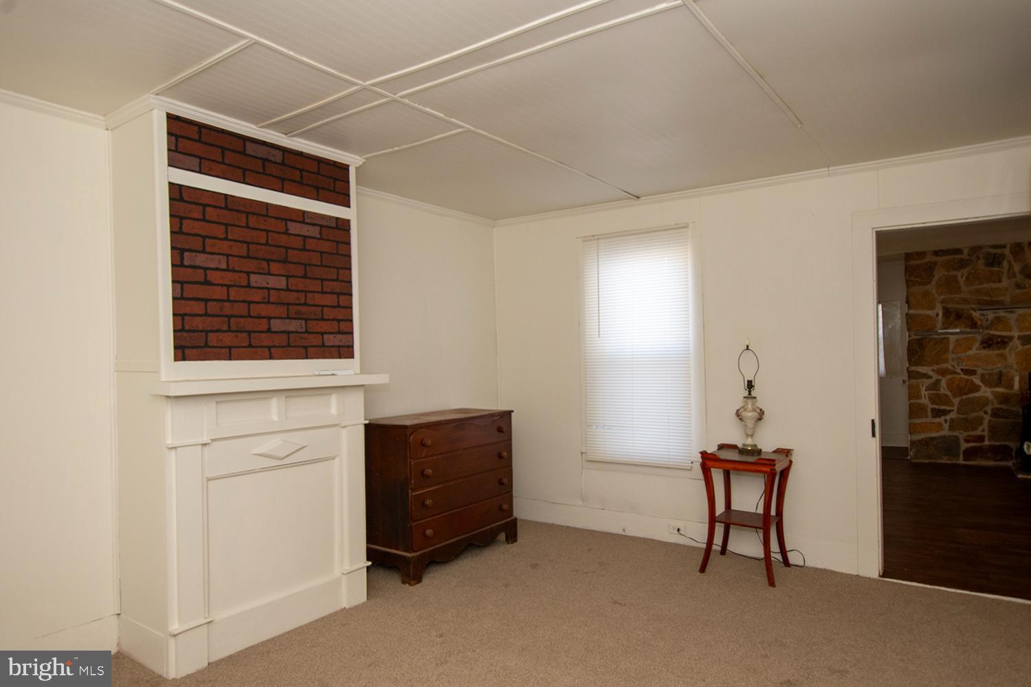 34463 Rider Road Delmar, DE 19940 - Photo 13 of 47 a view of a livingroom with furniture and a window