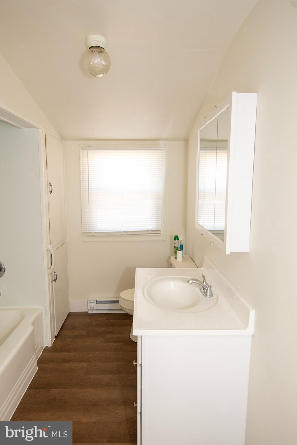 34463 Rider Road Delmar, DE 19940 - Photo 15 of 47 a bathroom with a sink a toilet and a bathtub
