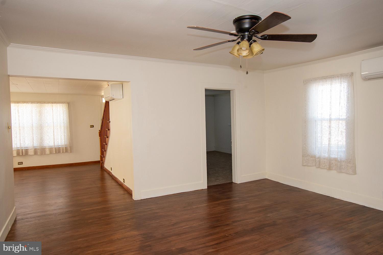 34463 Rider Road Delmar, DE 19940 - Photo 8 of 47 a view of an empty room with window and wooden floor
