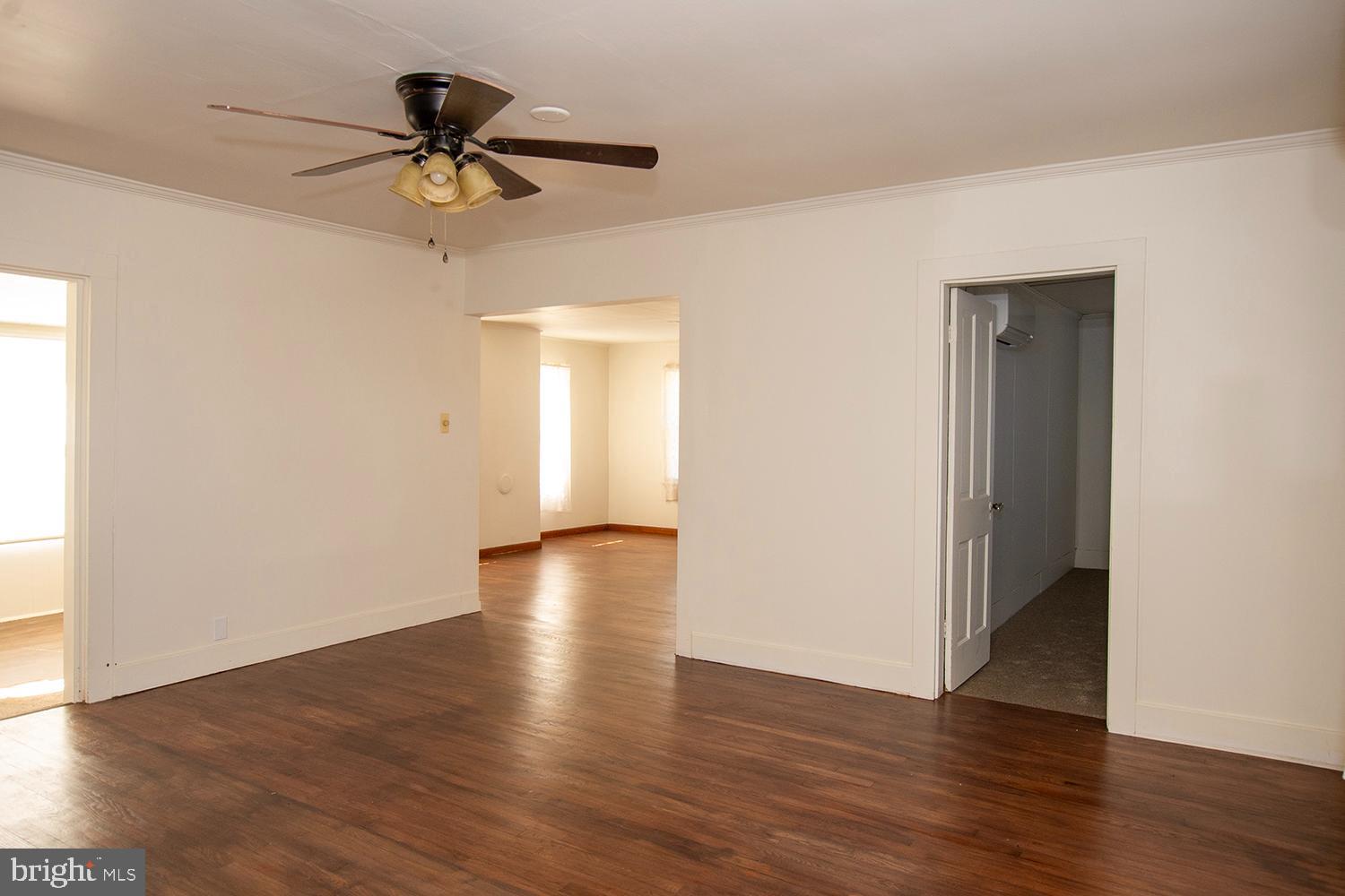34463 Rider Road Delmar, DE 19940 - Photo 9 of 47 a view of a room with wooden floor and a ceiling fan