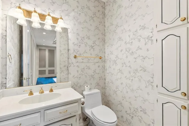 an entryway of a house with balcony