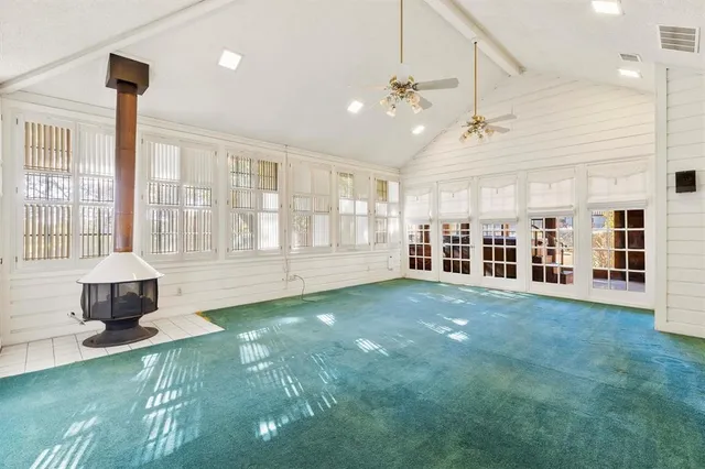 a big yard with lots of trees