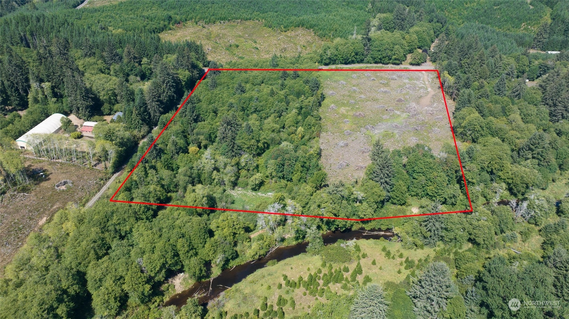 1-xx Primo Road Cosmopolis, WA 98537 - Photo 1 of 20 an aerial view of a house with a yard and lake view