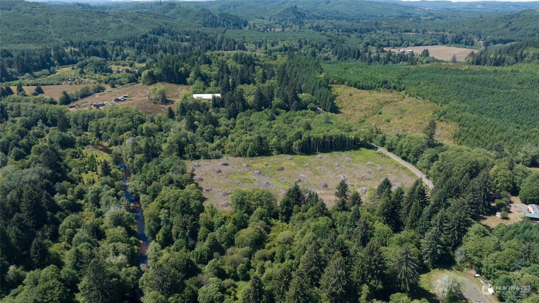 1-xx Primo Road Cosmopolis, WA 98537 - Photo 14 of 20 an aerial view of a house with a yard