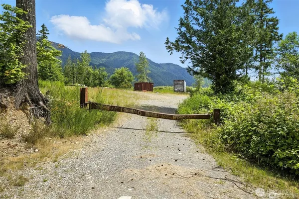 a view of a lake with a yard