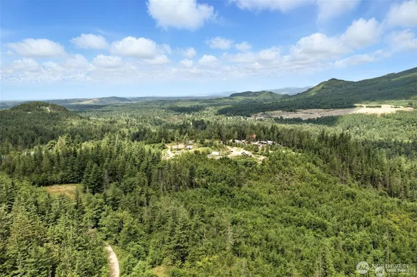 a view of lake with green space