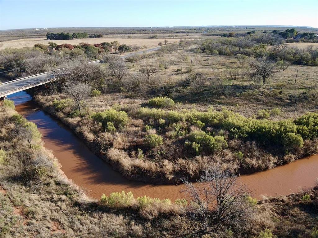 5900 West Lake Road Abilene, TX 79601 - Photo 15 of 19 a view of a lake with mountains in background