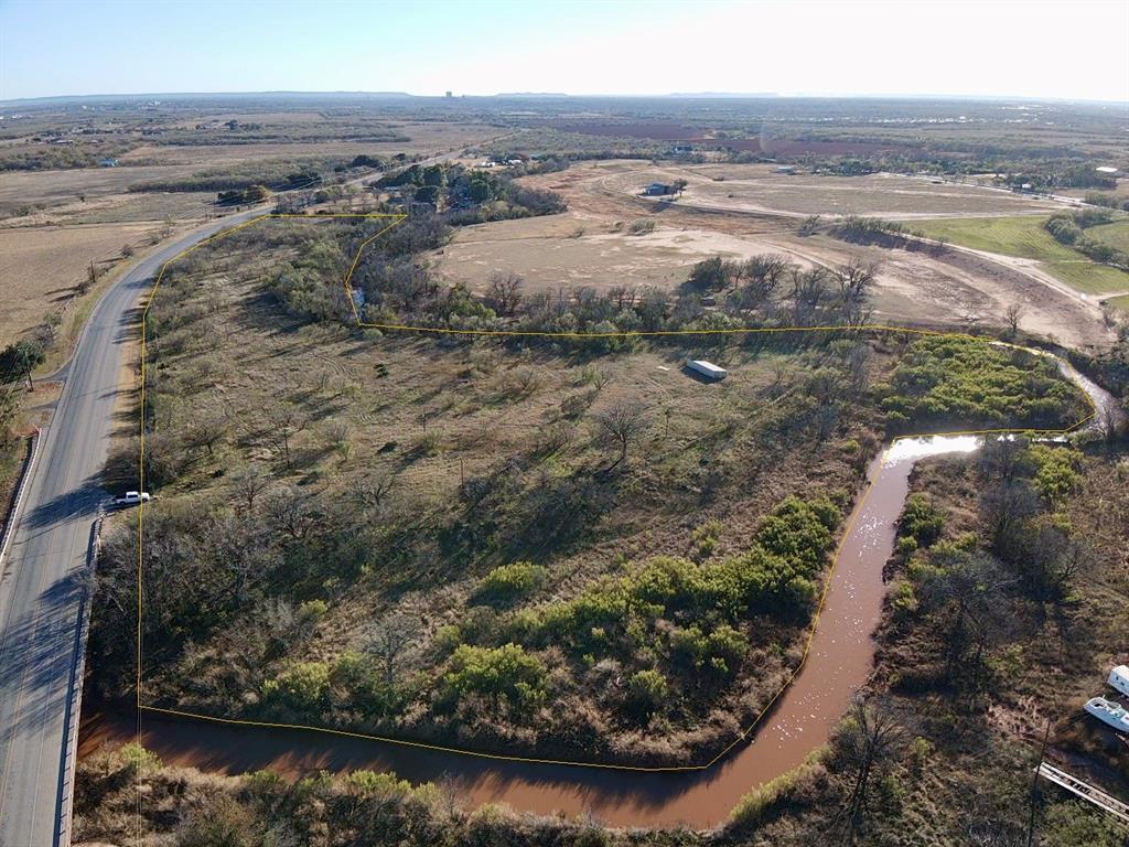 5900 West Lake Road Abilene, TX 79601 - Photo 2 of 19 a view of beach and ocean