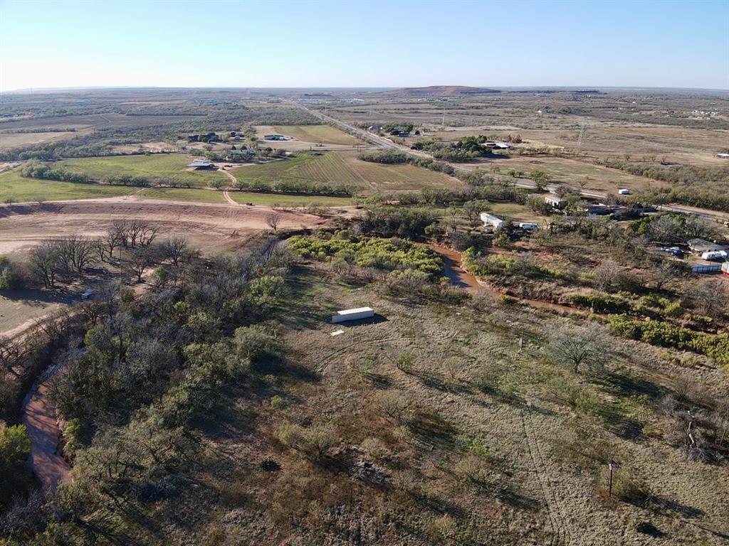 5900 West Lake Road Abilene, TX 79601 - Photo 9 of 19 an aerial view of beach and residential houses with outdoor space