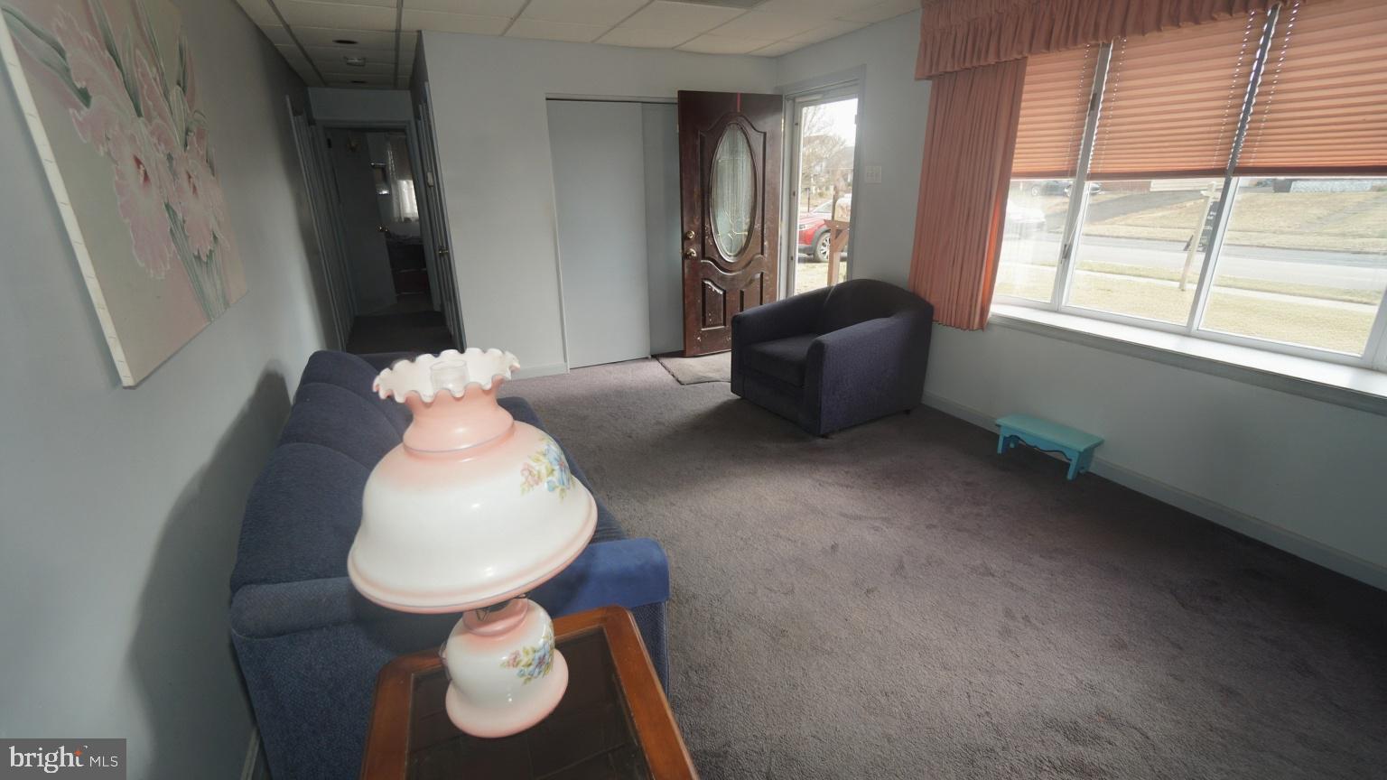 2832 Berwyn Road Bensalem, PA 19020 - Photo 8 of 12 a room with furniture and a large window