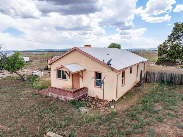 a view of a terrace with a garden