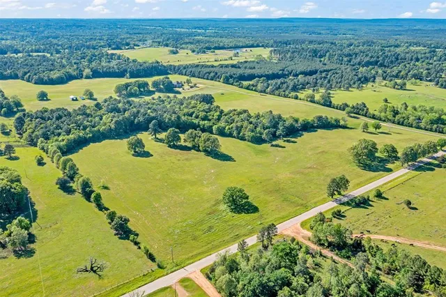 a view of swimming pool from a lake