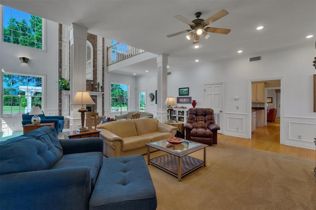 192301 North 4205th Road Antlers, OK 74523 - Photo 10 of 40 a living room with furniture and a chandelier