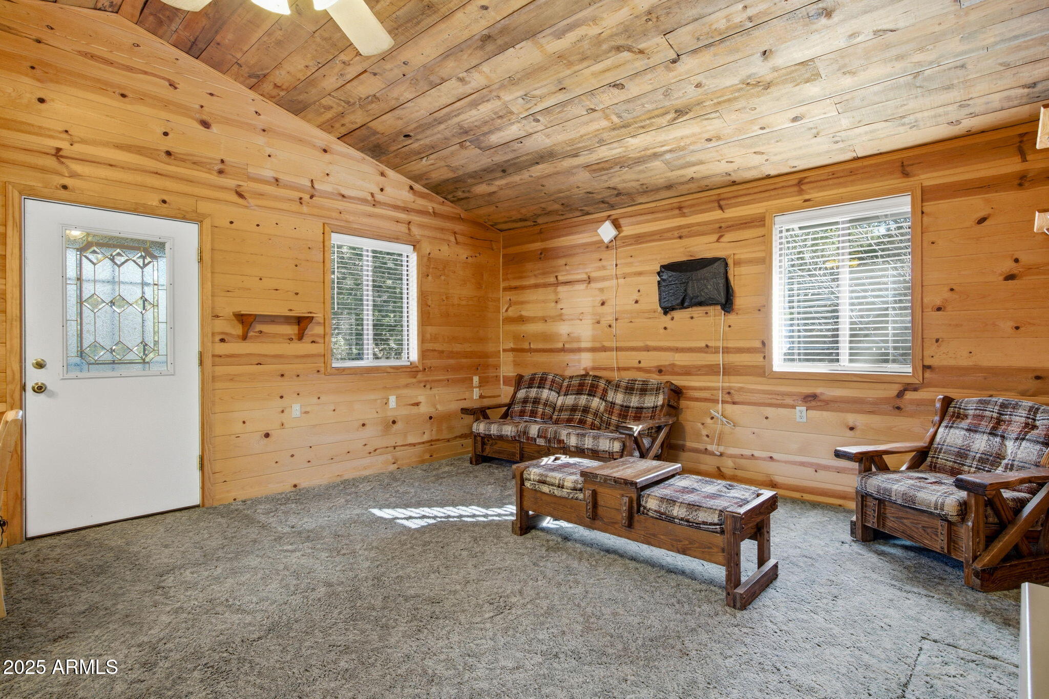 3157 Tonto Drive Overgaard, AZ 85933 - Photo 7 of 22 a outdoor living space with furniture and brick walls
