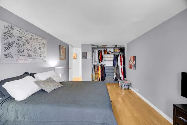 a bed room with a bed and a couch