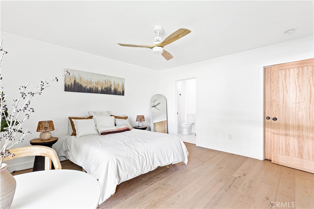 950 Morada Place Altadena, CA 91001 - Photo 19 of 30 a bedroom with double bed and a window