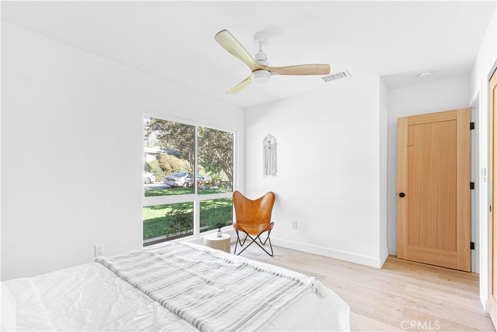 950 Morada Place Altadena, CA 91001 - Photo 22 of 30 a bedroom with a bed and a window