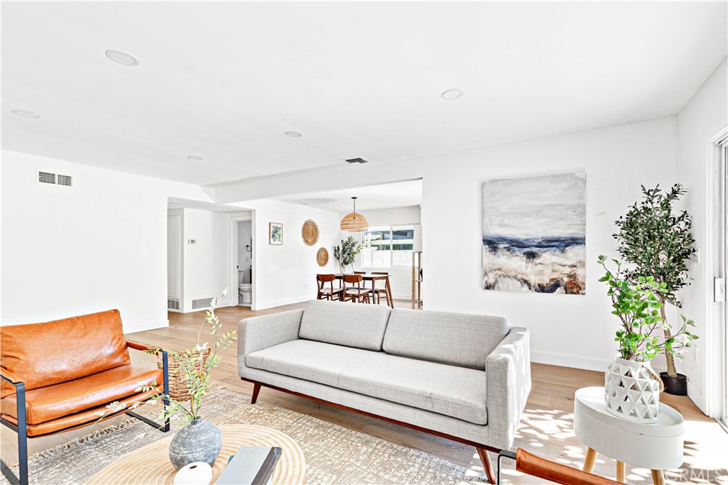 950 Morada Place Altadena, CA 91001 - Photo 3 of 30 a living room with furniture and a potted plant