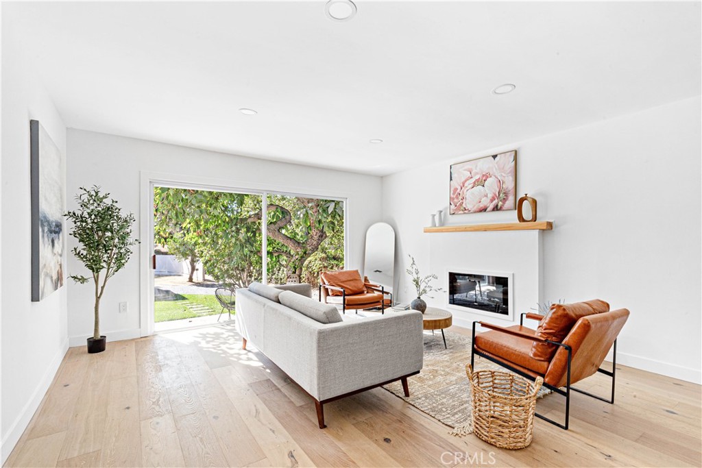 950 Morada Place Altadena, CA 91001 - Photo 4 of 30 a living room with furniture and a fireplace