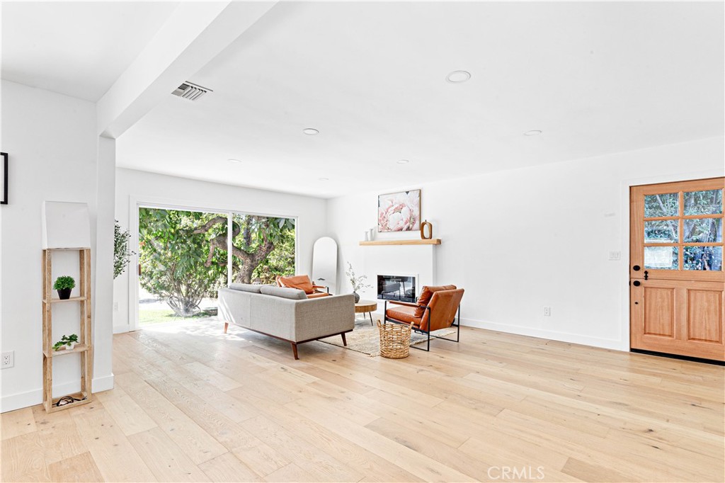 950 Morada Place Altadena, CA 91001 - Photo 6 of 30 a living room with furniture and a large window