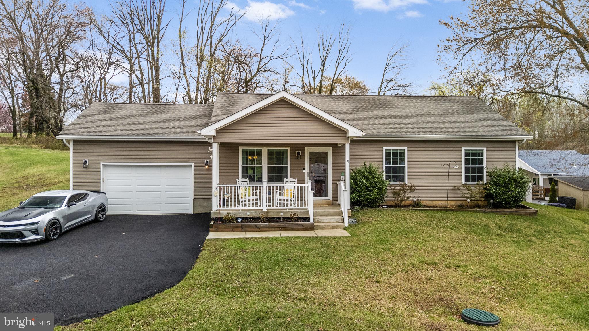 1915 Larkin Road Upper Chichester, PA 19061 - Photo 1 of 23 a house view with a garden space
