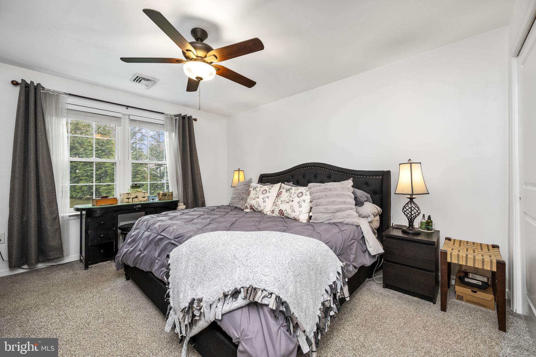1915 Larkin Road Upper Chichester, PA 19061 - Photo 13 of 23 a bedroom with a bed and window