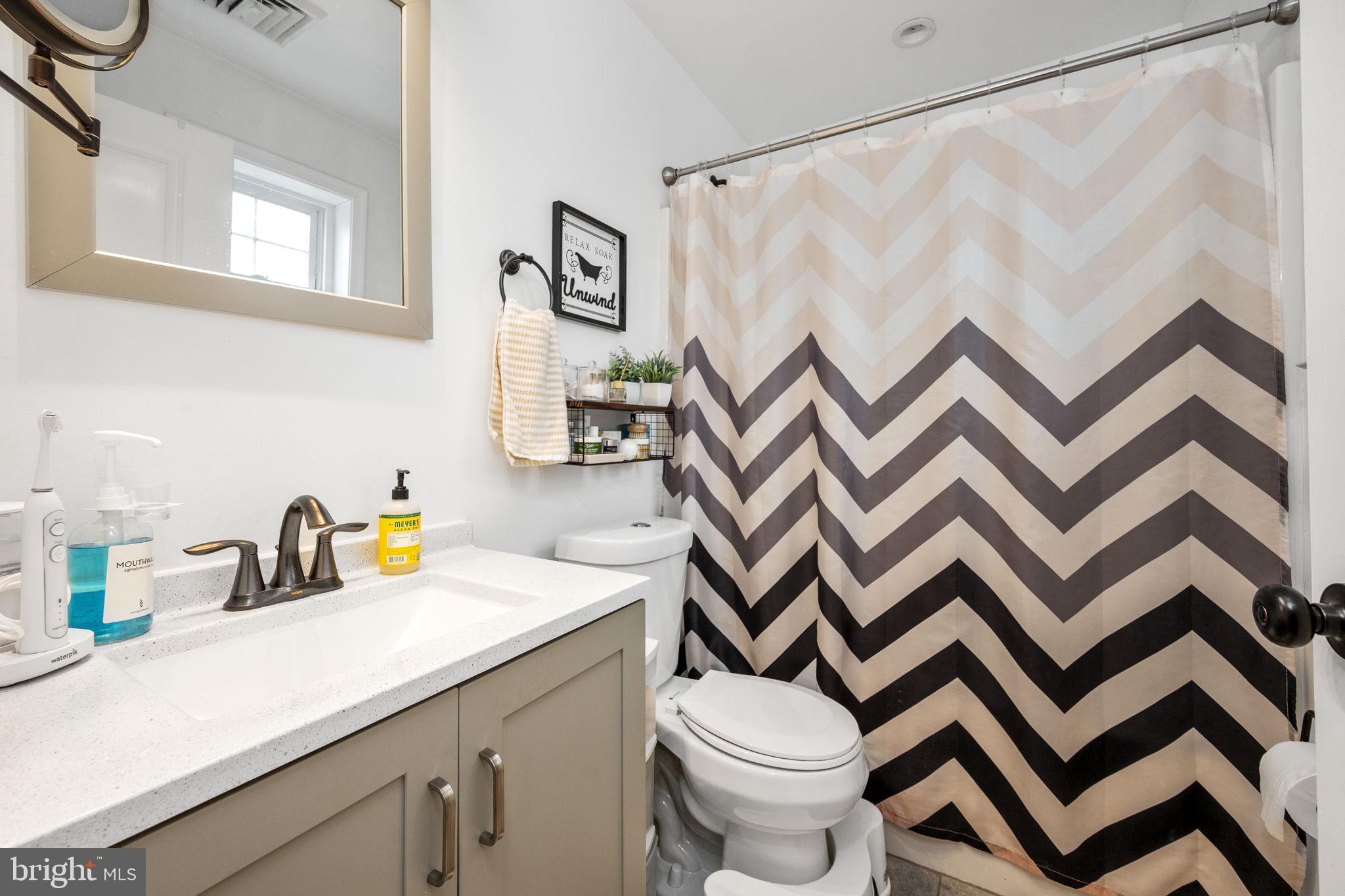 1915 Larkin Road Upper Chichester, PA 19061 - Photo 15 of 23 a bathroom with a sink and a toilet