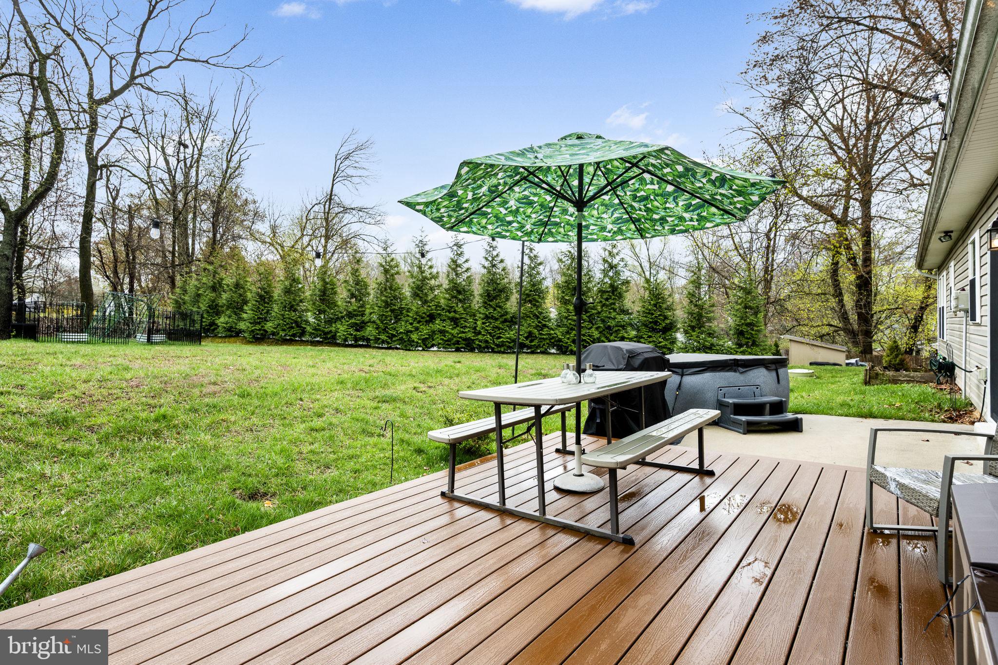 1915 Larkin Road Upper Chichester, PA 19061 - Photo 20 of 23 a view of a deck with wooden floor and yard