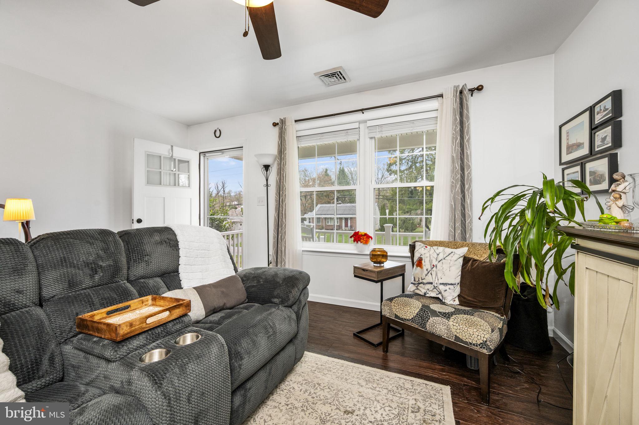 1915 Larkin Road Upper Chichester, PA 19061 - Photo 10 of 23 a living room with furniture and a large window