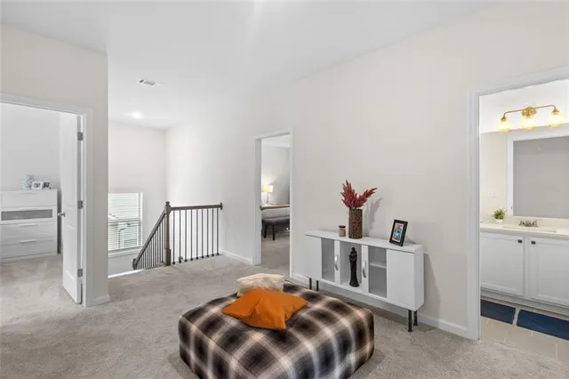 a view of a house with backyard and trees