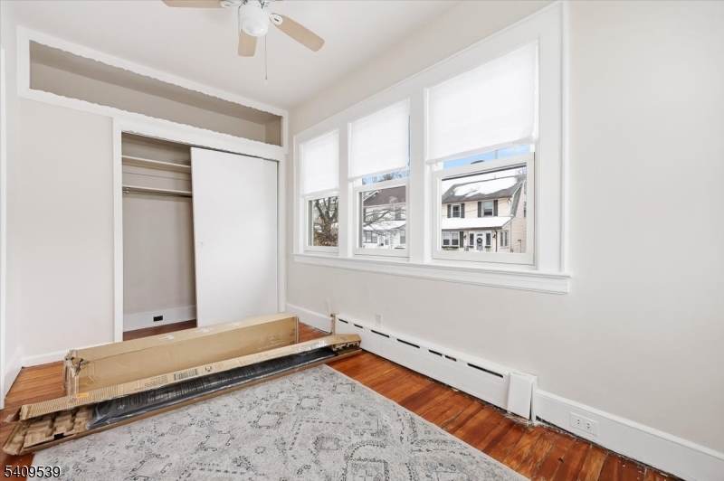 57 Menzel Avenue Maplewood, NJ 07040 - Photo 8 of 21 a bedroom with a bed and a window