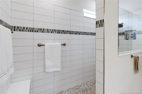 a view of a patio with a table chairs and a table