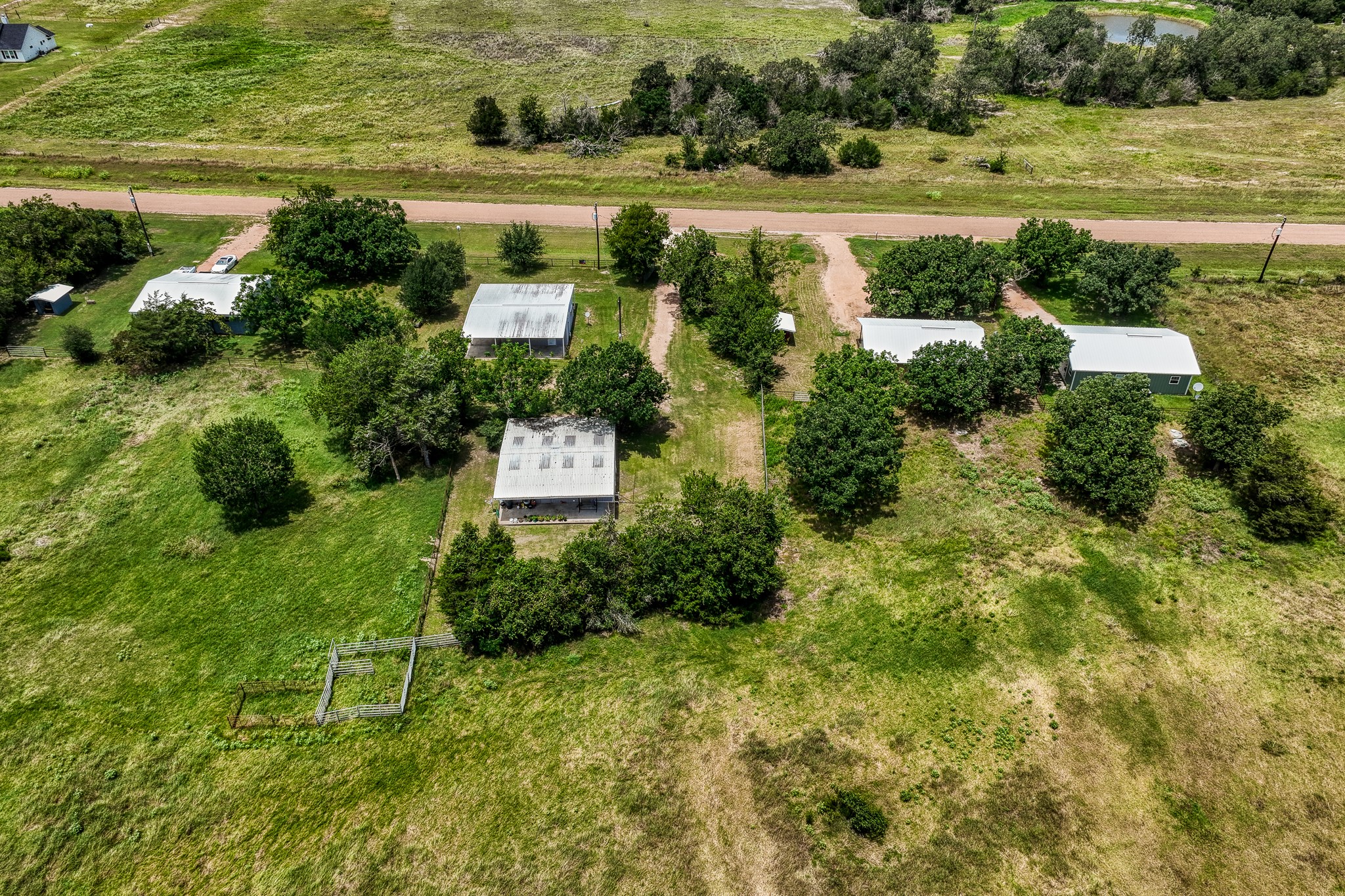 800 Waldeck Road Ledbetter, TX 78946 - Photo 6 of 6 a view of a garden with a lake