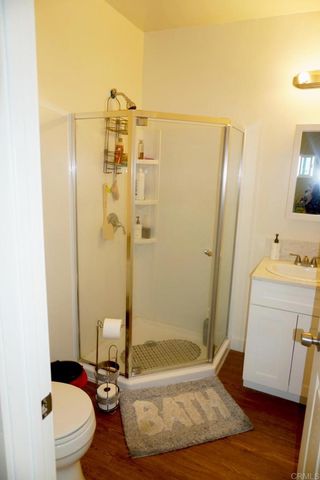 a bathroom with a tub a toilet and a sink