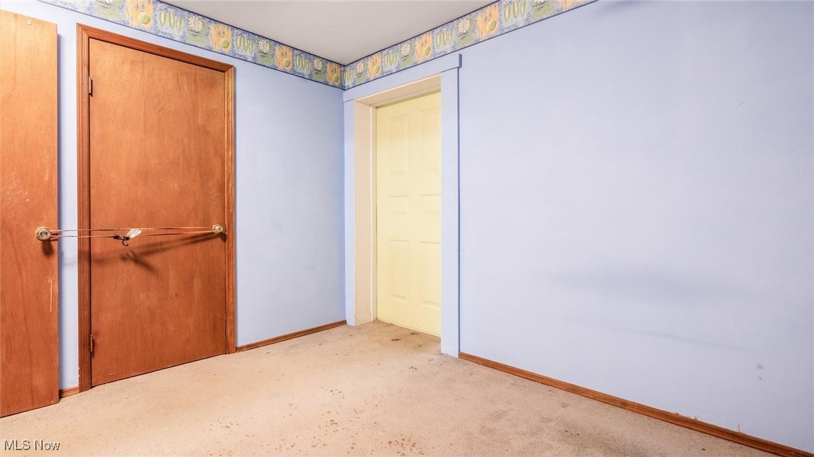 1950 Newark Road Zanesville, OH 43701 - Photo 38 of 39 View of carpeted spare room