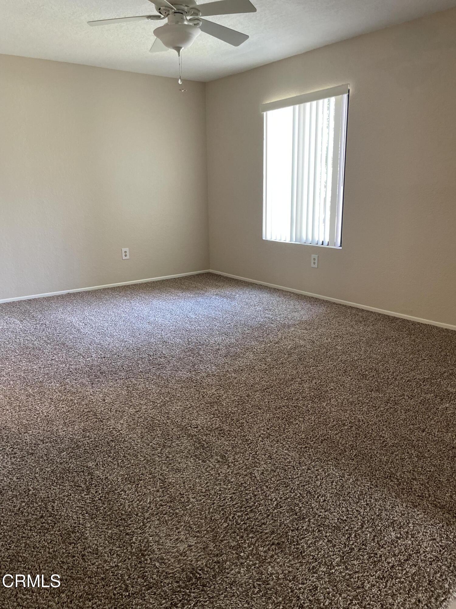 600 Central Avenue, Unit 316 Riverside, CA 92507 - Photo 7 of 9 an empty room with a window