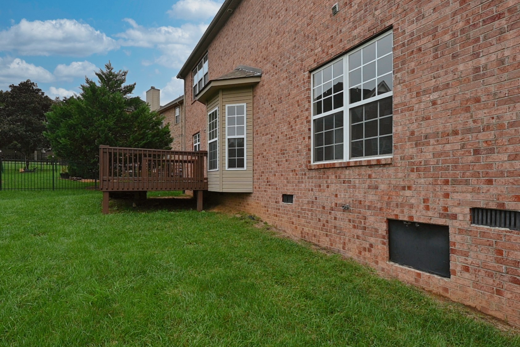 7309 Smokey Hill Road Antioch, TN 37013 - Photo 15 of 88 a view of house with backyard and a garden