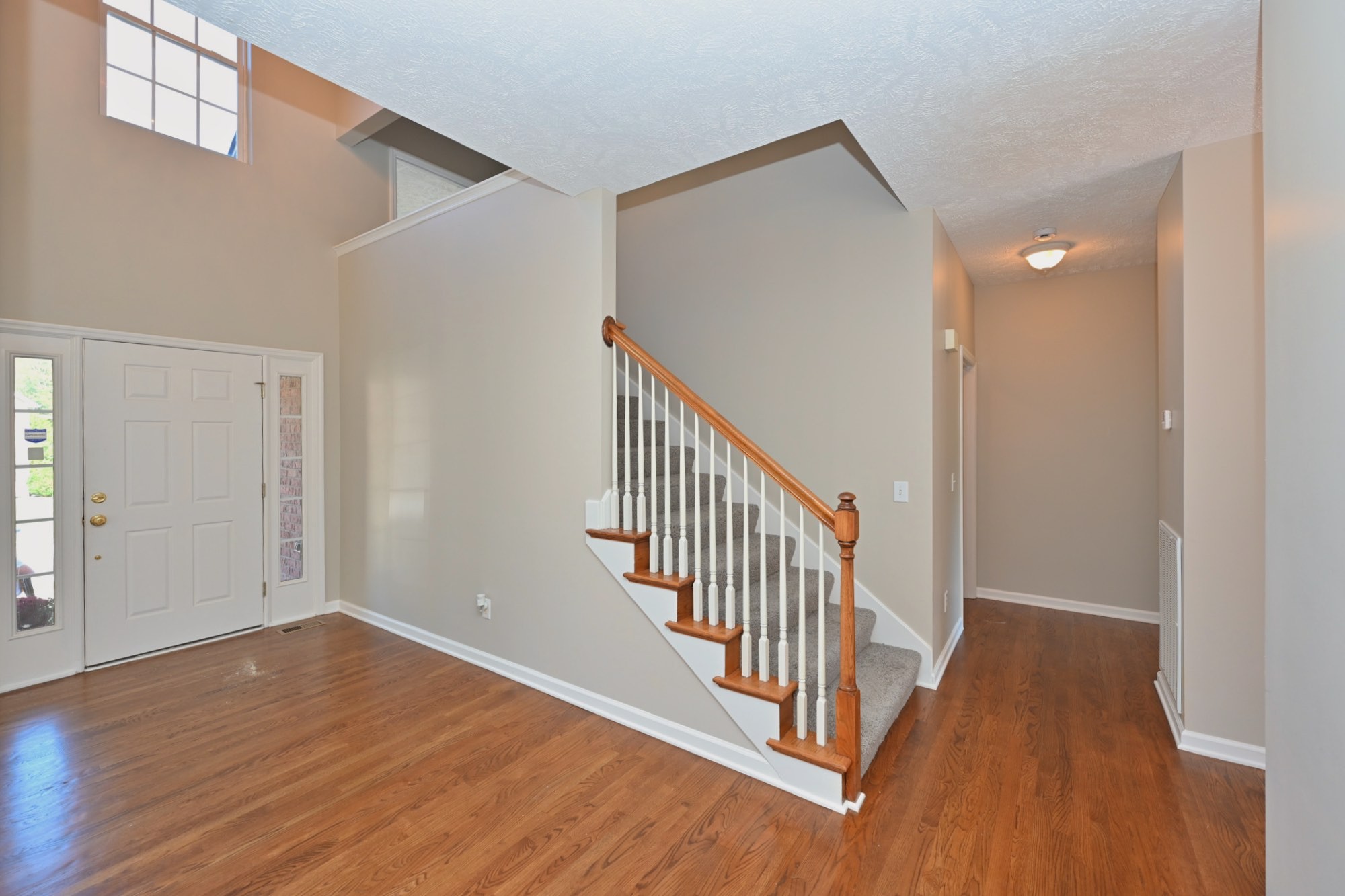 7309 Smokey Hill Road Antioch, TN 37013 - Photo 28 of 88 a view of a hallway with wooden floor and stairs