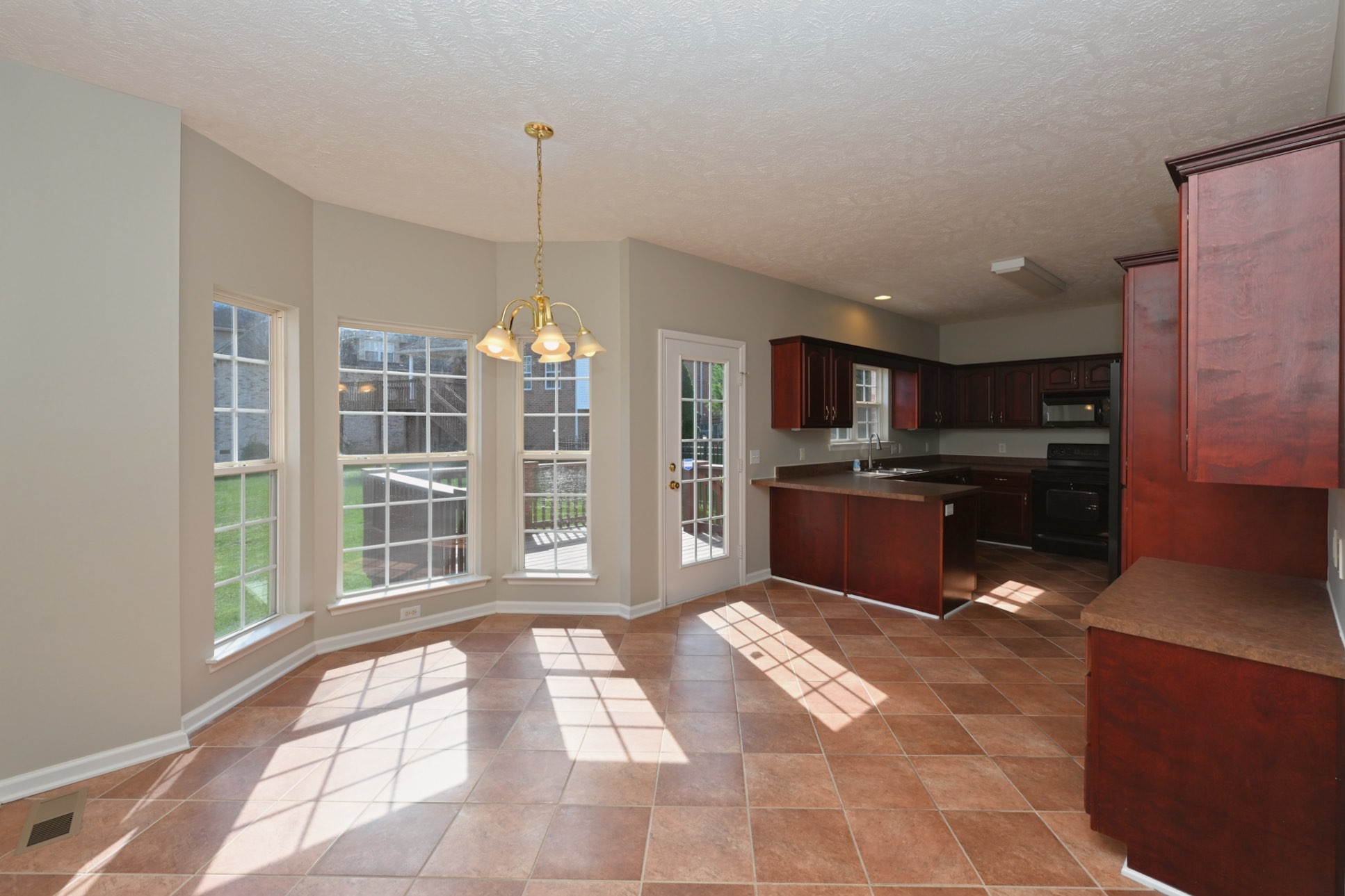 7309 Smokey Hill Road Antioch, TN 37013 - Photo 31 of 88 a kitchen with stainless steel appliances granite countertop a stove a sink and a refrigerator