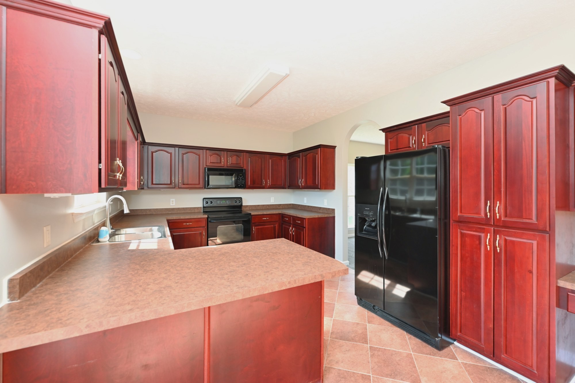 7309 Smokey Hill Road Antioch, TN 37013 - Photo 33 of 88 a kitchen with stainless steel appliances granite countertop a refrigerator and a sink