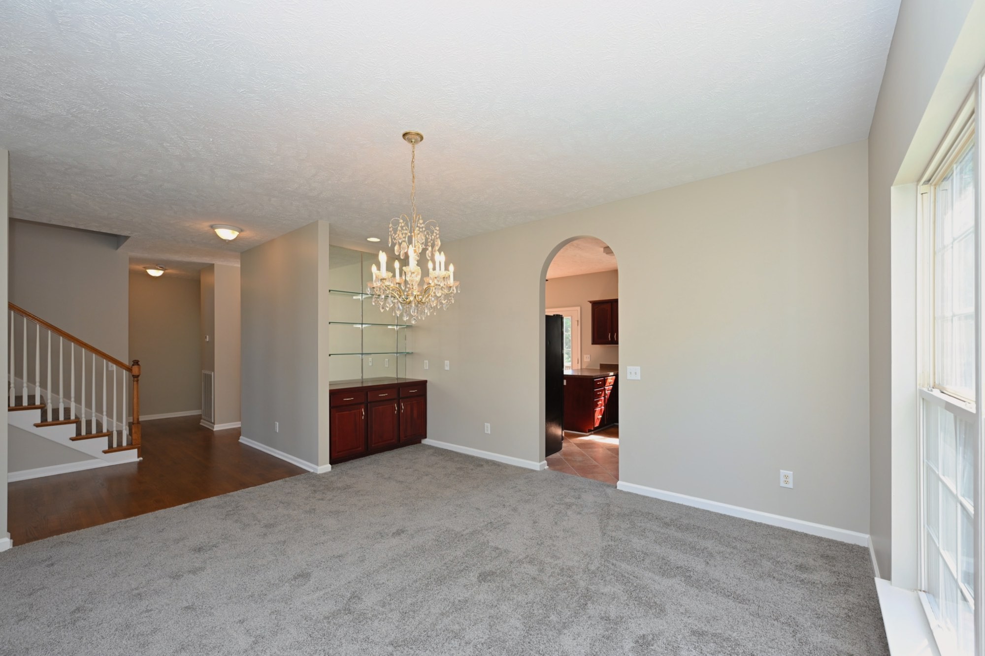 7309 Smokey Hill Road Antioch, TN 37013 - Photo 44 of 88 an empty room with chandelier fan and windows