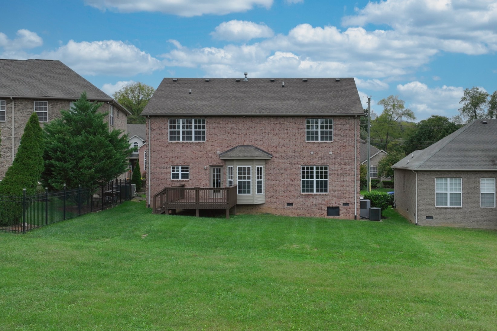 7309 Smokey Hill Road Antioch, TN 37013 - Photo 7 of 88 front view of a house with a yard and a garden
