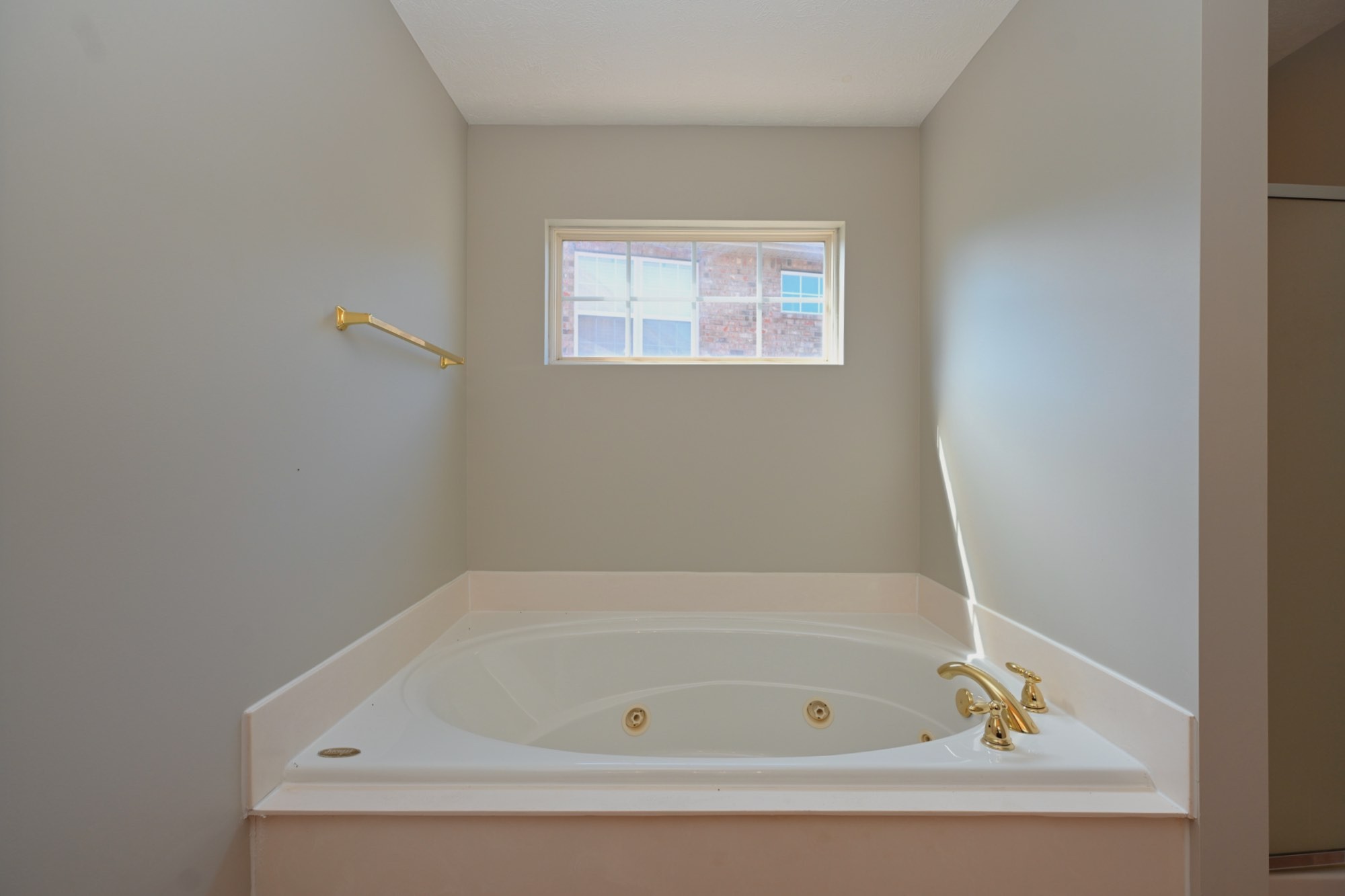 7309 Smokey Hill Road Antioch, TN 37013 - Photo 77 of 88 a white bath tub sitting next to a window