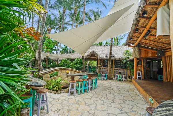 a view of a chairs and table in the patio