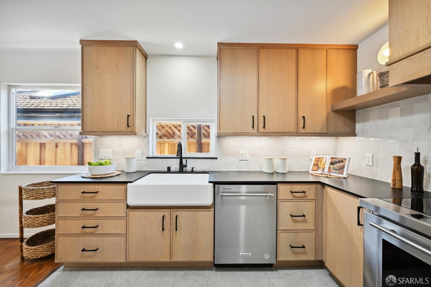 1208 Peach Street Alameda, CA 94501 - Photo 11 of 31 a kitchen with granite countertop a sink stainless steel appliances and cabinets