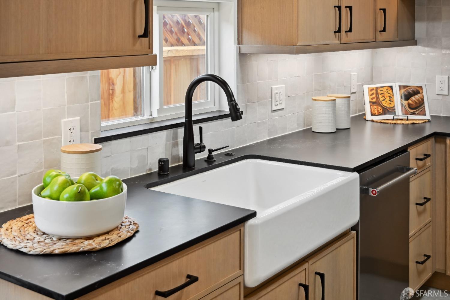 1208 Peach Street Alameda, CA 94501 - Photo 12 of 31 a kitchen with a sink and a potted plant