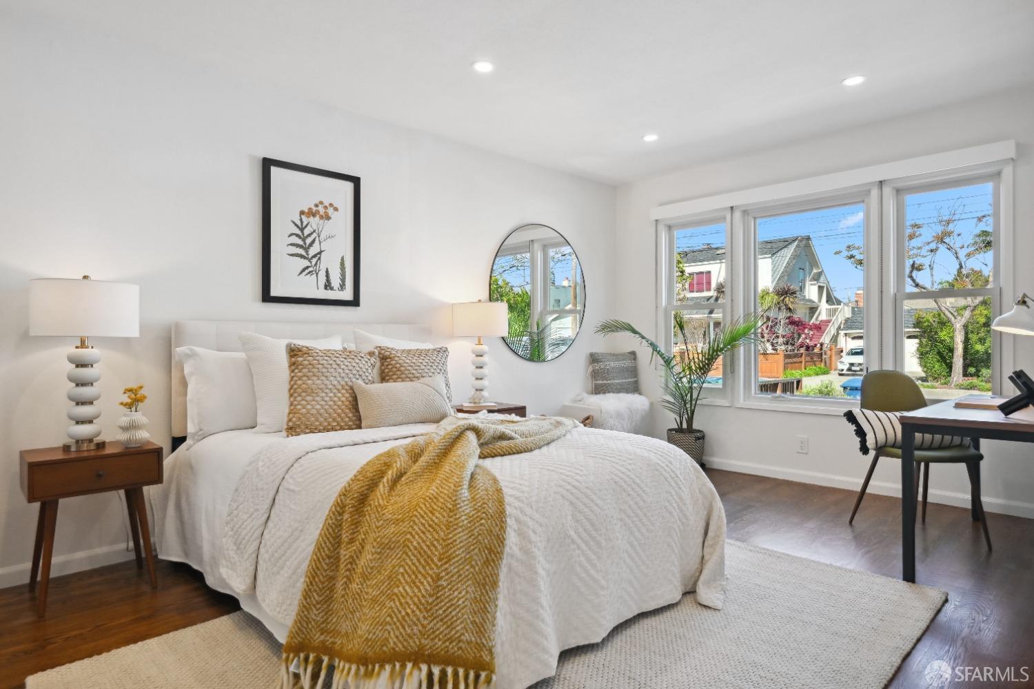 1208 Peach Street Alameda, CA 94501 - Photo 15 of 31 a spacious bedroom with a bed and a large window