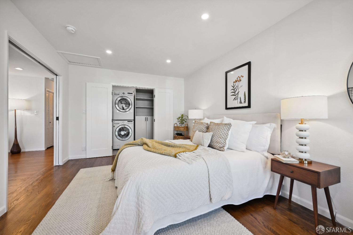 1208 Peach Street Alameda, CA 94501 - Photo 17 of 31 a bedroom with a bed and a lamp