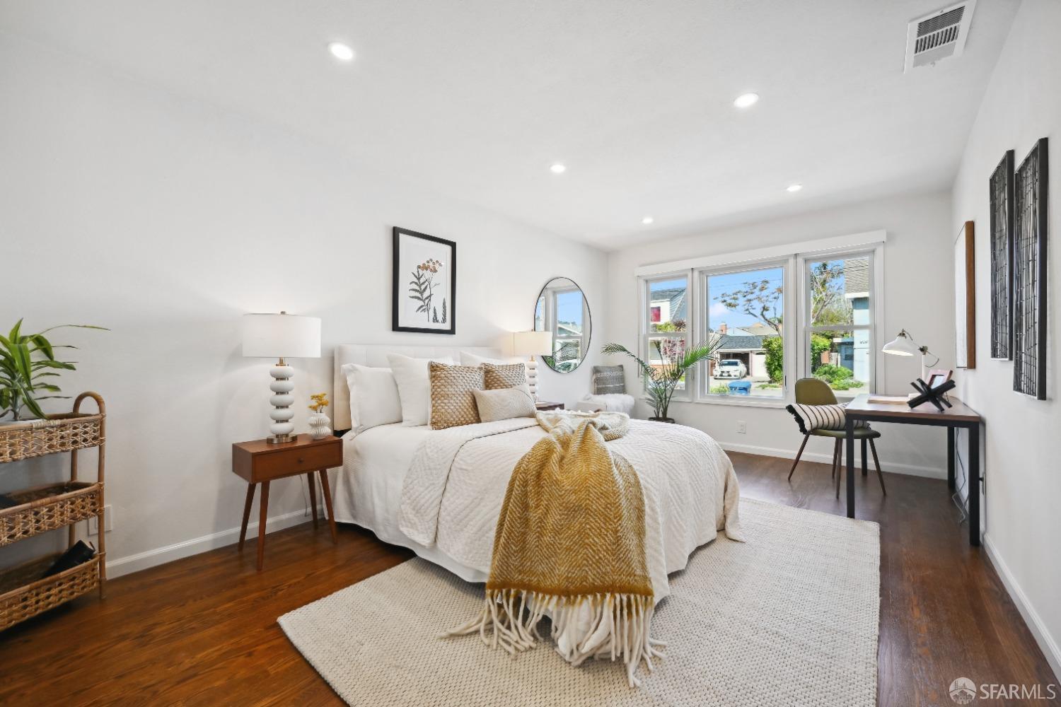 1208 Peach Street Alameda, CA 94501 - Photo 19 of 31 a bed room with a bed and a chair